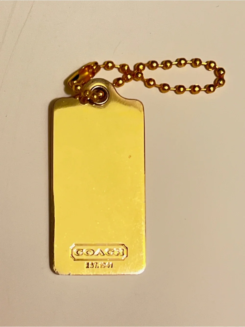 Very Rare Vintage Coach Gold Horse & Carriage Tag Key Holder and bag charm.